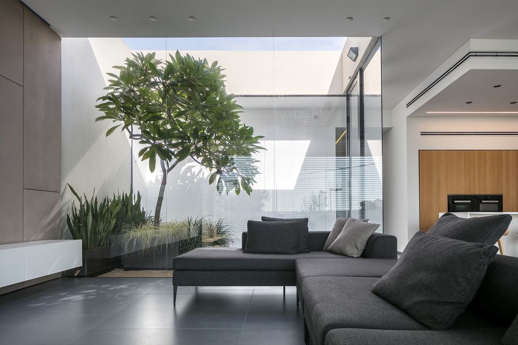 House F creates clean, modern & in-outdoor spaces by A.M.N Architecture