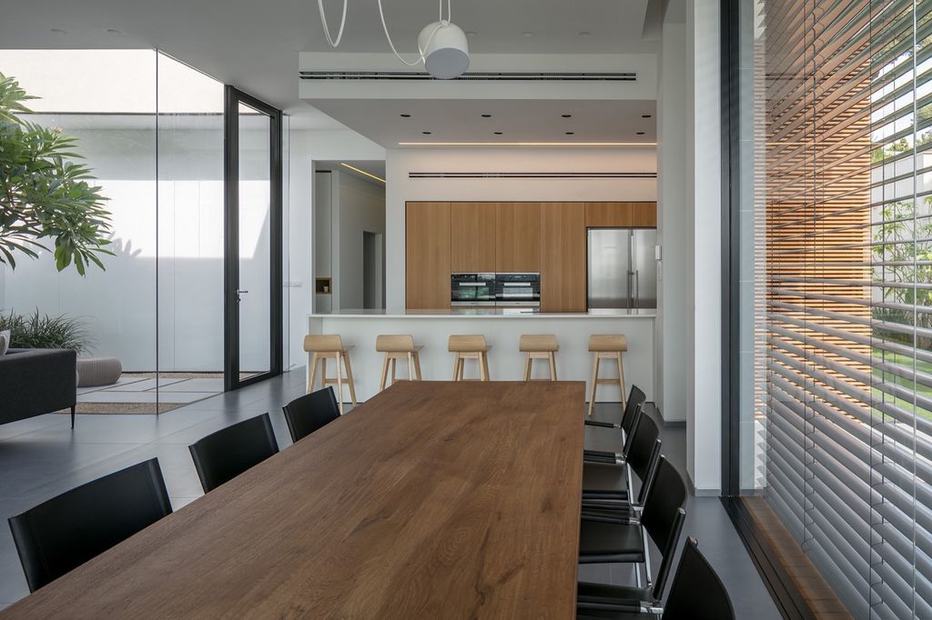 House F creates clean, modern & in-outdoor spaces by A.M.N Architecture