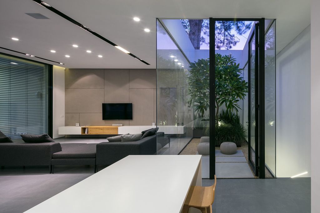 House F creates clean, modern & in-outdoor spaces by A.M.N Architecture