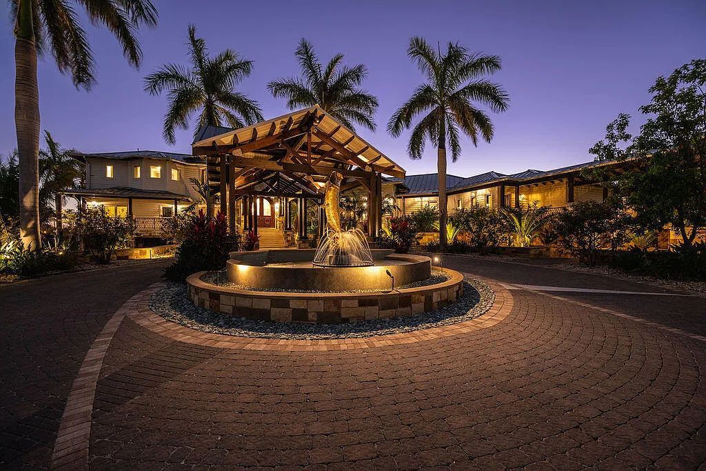 Introducing 1300 Sunset Boulevard, Tarpon Ranch—an elegant private estate in Summerland Key, Florida. Just minutes from Key West, this luxurious property offers relaxed coastal living at its finest. With 6 bedrooms, 8 bathrooms, and 7,720 square feet of living space on a 1.35-acre lot, it's a masterpiece of architectural splendor.