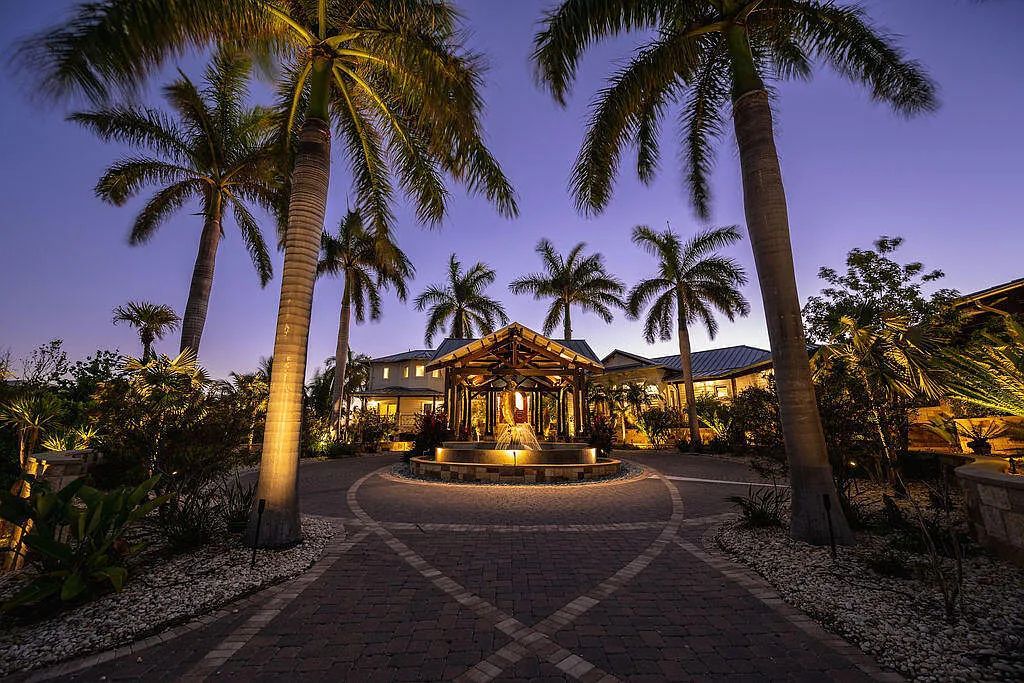 Introducing 1300 Sunset Boulevard, Tarpon Ranch—an elegant private estate in Summerland Key, Florida. Just minutes from Key West, this luxurious property offers relaxed coastal living at its finest. With 6 bedrooms, 8 bathrooms, and 7,720 square feet of living space on a 1.35-acre lot, it's a masterpiece of architectural splendor.
