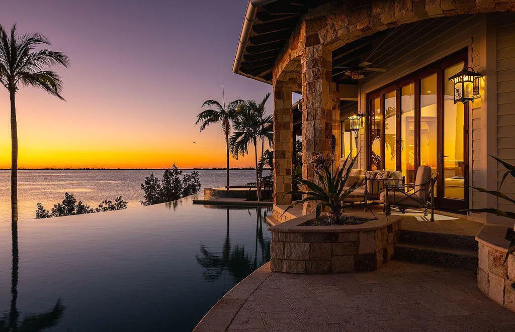 Introducing 1300 Sunset Boulevard, Tarpon Ranch—an elegant private estate in Summerland Key, Florida. Just minutes from Key West, this luxurious property offers relaxed coastal living at its finest. With 6 bedrooms, 8 bathrooms, and 7,720 square feet of living space on a 1.35-acre lot, it's a masterpiece of architectural splendor.