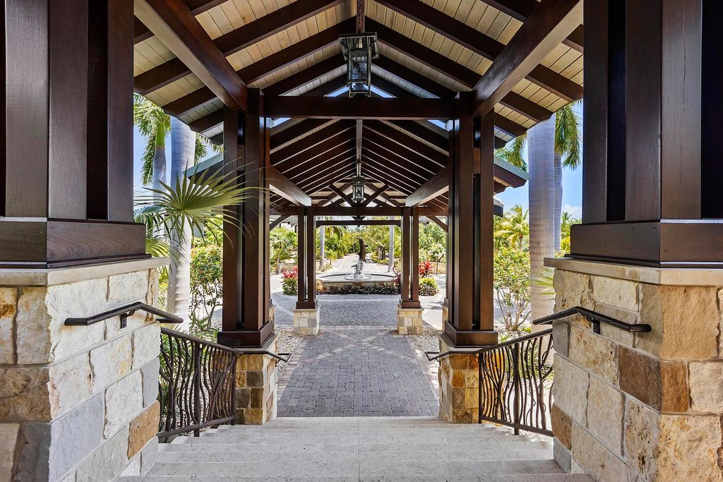 Introducing 1300 Sunset Boulevard, Tarpon Ranch—an elegant private estate in Summerland Key, Florida. Just minutes from Key West, this luxurious property offers relaxed coastal living at its finest. With 6 bedrooms, 8 bathrooms, and 7,720 square feet of living space on a 1.35-acre lot, it's a masterpiece of architectural splendor.