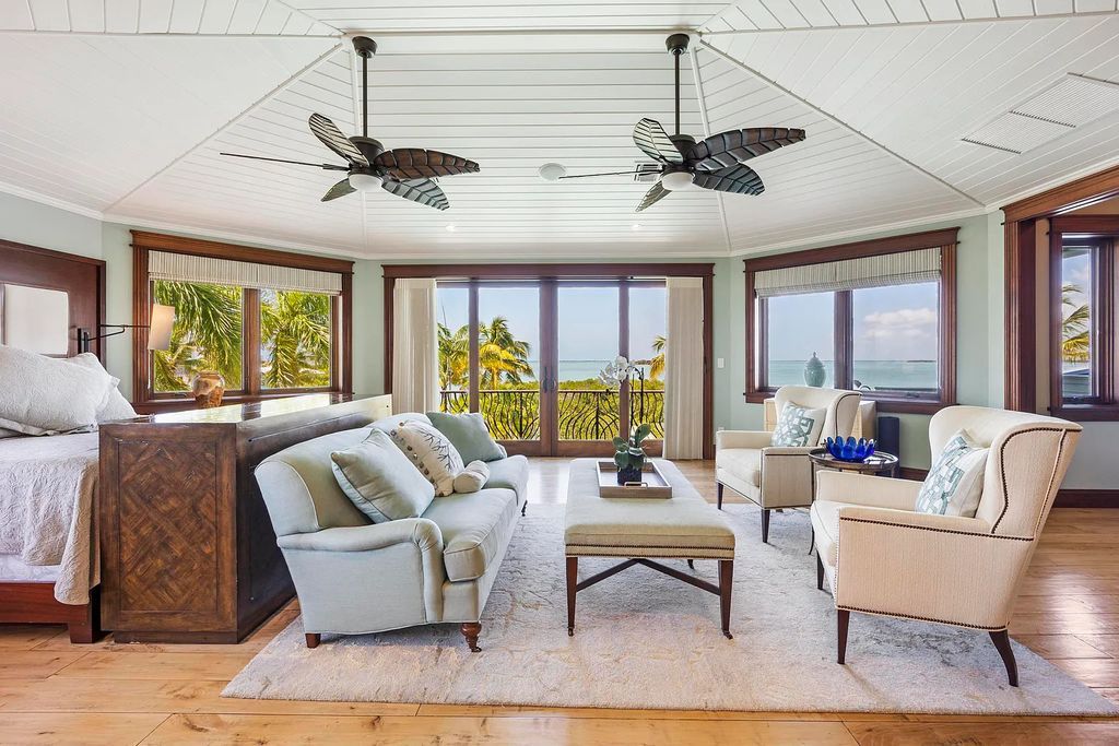 Introducing 1300 Sunset Boulevard, Tarpon Ranch—an elegant private estate in Summerland Key, Florida. Just minutes from Key West, this luxurious property offers relaxed coastal living at its finest. With 6 bedrooms, 8 bathrooms, and 7,720 square feet of living space on a 1.35-acre lot, it's a masterpiece of architectural splendor.