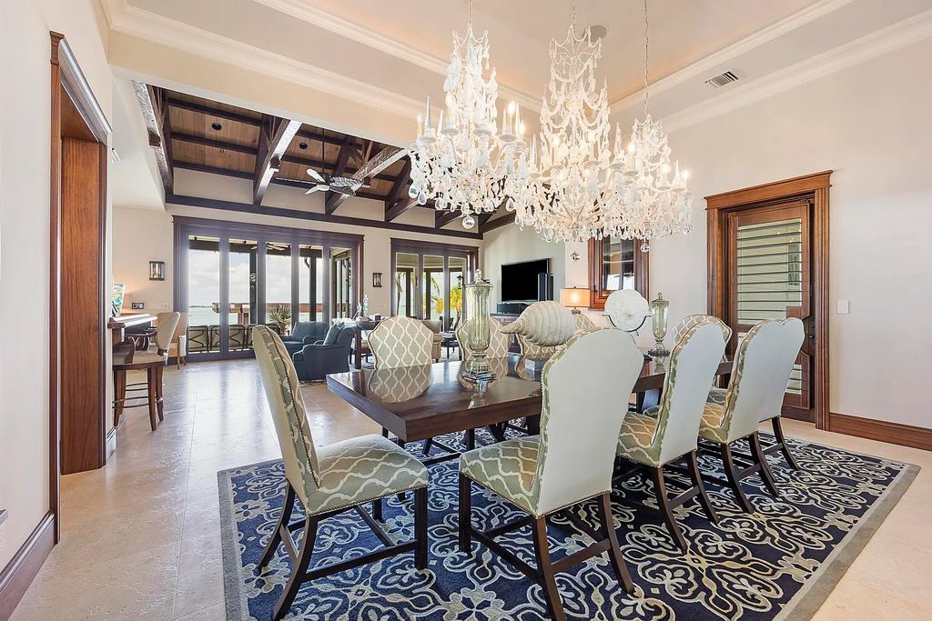 Introducing 1300 Sunset Boulevard, Tarpon Ranch—an elegant private estate in Summerland Key, Florida. Just minutes from Key West, this luxurious property offers relaxed coastal living at its finest. With 6 bedrooms, 8 bathrooms, and 7,720 square feet of living space on a 1.35-acre lot, it's a masterpiece of architectural splendor.