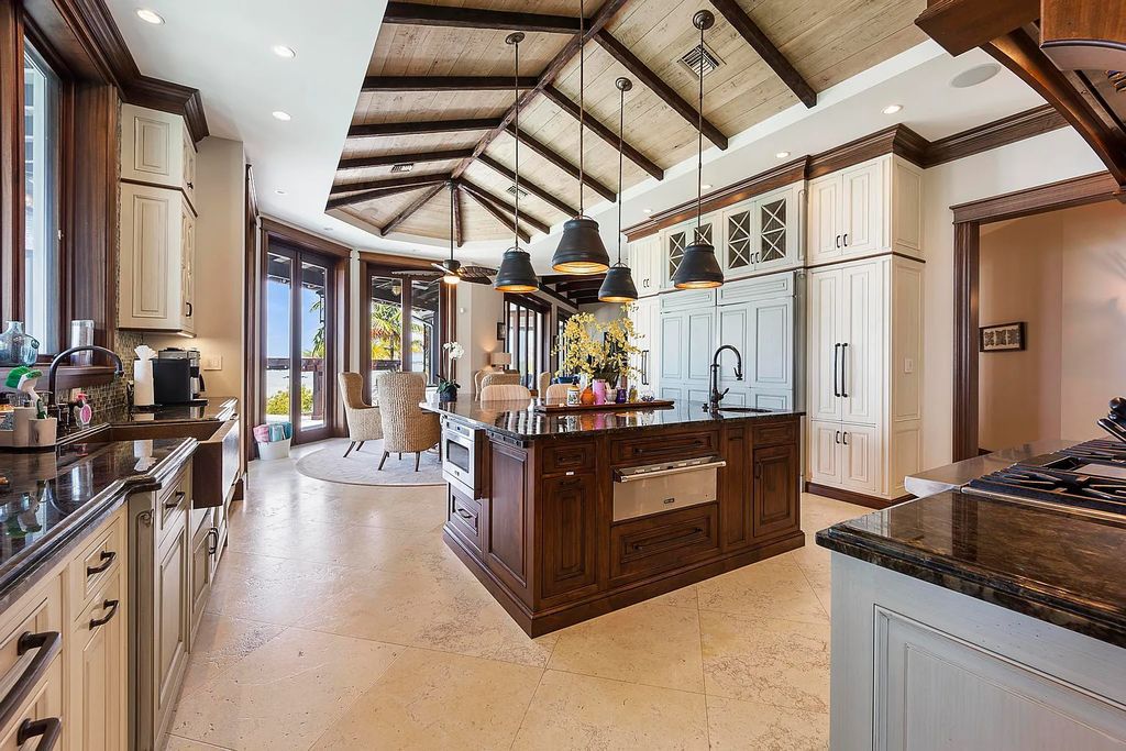 Introducing 1300 Sunset Boulevard, Tarpon Ranch—an elegant private estate in Summerland Key, Florida. Just minutes from Key West, this luxurious property offers relaxed coastal living at its finest. With 6 bedrooms, 8 bathrooms, and 7,720 square feet of living space on a 1.35-acre lot, it's a masterpiece of architectural splendor.