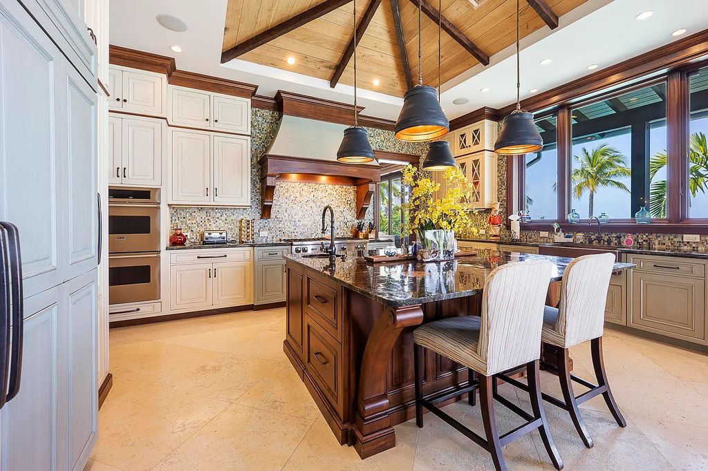 Introducing 1300 Sunset Boulevard, Tarpon Ranch—an elegant private estate in Summerland Key, Florida. Just minutes from Key West, this luxurious property offers relaxed coastal living at its finest. With 6 bedrooms, 8 bathrooms, and 7,720 square feet of living space on a 1.35-acre lot, it's a masterpiece of architectural splendor.