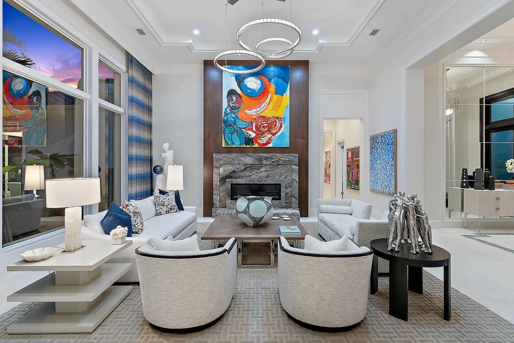 Welcome to 11771 Calleta Court, a luxurious furnished residence in Palm Beach Gardens, Florida. This exceptional home in the Grand Estates of Old Palm Golf Club offers timeless elegance, meticulous craftsmanship, and a desirable location.
