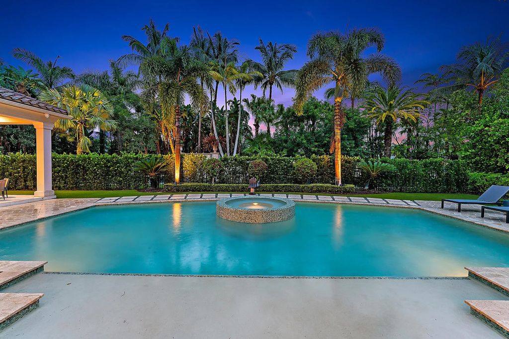 Welcome to 11771 Calleta Court, a luxurious furnished residence in Palm Beach Gardens, Florida. This exceptional home in the Grand Estates of Old Palm Golf Club offers timeless elegance, meticulous craftsmanship, and a desirable location.