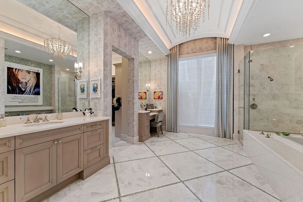 Welcome to 11771 Calleta Court, a luxurious furnished residence in Palm Beach Gardens, Florida. This exceptional home in the Grand Estates of Old Palm Golf Club offers timeless elegance, meticulous craftsmanship, and a desirable location.