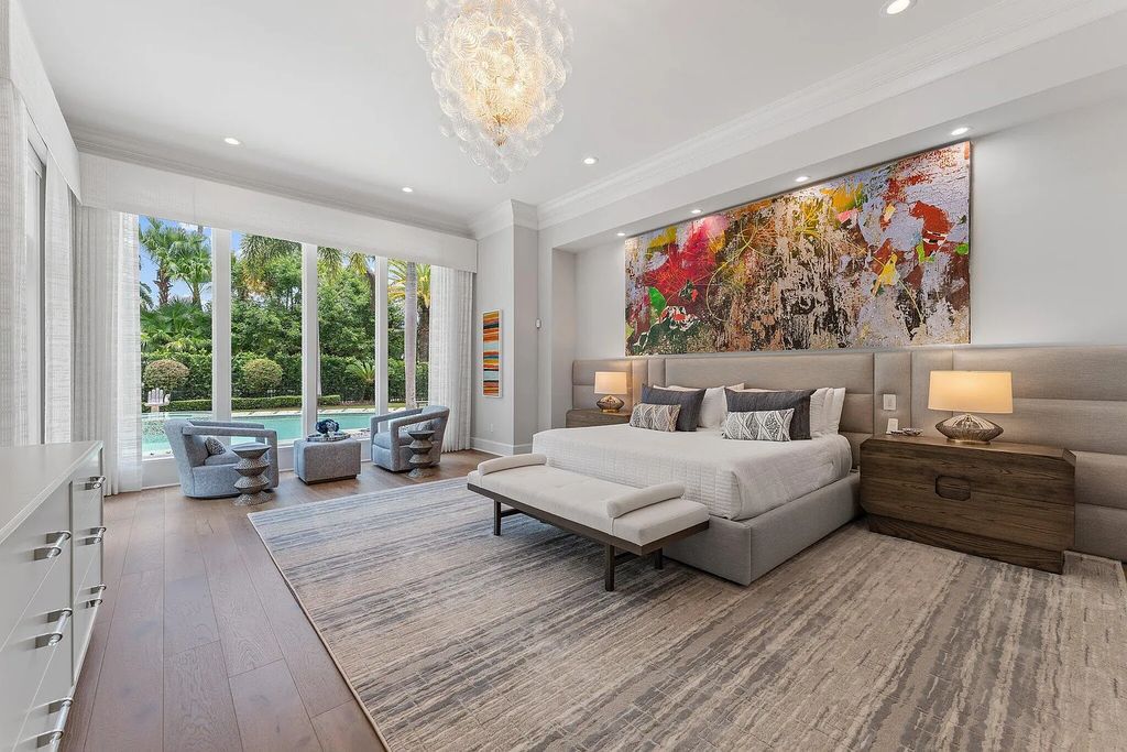 Welcome to 11771 Calleta Court, a luxurious furnished residence in Palm Beach Gardens, Florida. This exceptional home in the Grand Estates of Old Palm Golf Club offers timeless elegance, meticulous craftsmanship, and a desirable location.