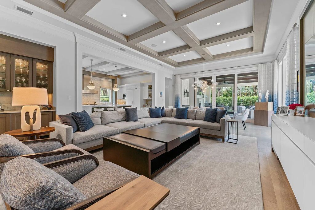 Welcome to 11771 Calleta Court, a luxurious furnished residence in Palm Beach Gardens, Florida. This exceptional home in the Grand Estates of Old Palm Golf Club offers timeless elegance, meticulous craftsmanship, and a desirable location.