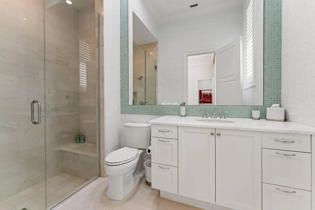 Welcome to 11771 Calleta Court, a luxurious furnished residence in Palm Beach Gardens, Florida. This exceptional home in the Grand Estates of Old Palm Golf Club offers timeless elegance, meticulous craftsmanship, and a desirable location.