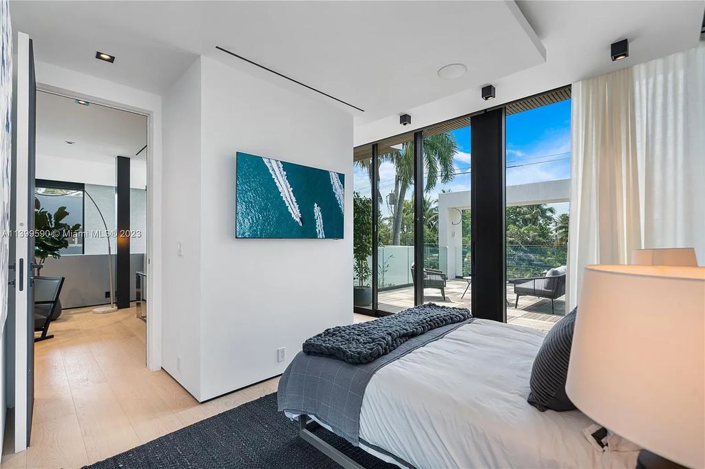 Welcome to Villa Marco at 1369 N Venetian Way, Miami Beach, Florida. Developed by Sabal Development, this masterfully crafted residence captures breathtaking bay views and natural light. With 5 beds and 6 baths spanning 7,283 sqft, it offers elegance, relaxation, and entertainment. 