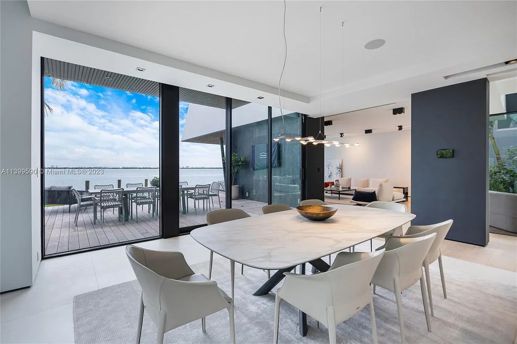 Welcome to Villa Marco at 1369 N Venetian Way, Miami Beach, Florida. Developed by Sabal Development, this masterfully crafted residence captures breathtaking bay views and natural light. With 5 beds and 6 baths spanning 7,283 sqft, it offers elegance, relaxation, and entertainment. 