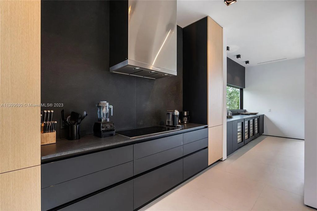 Welcome to Villa Marco at 1369 N Venetian Way, Miami Beach, Florida. Developed by Sabal Development, this masterfully crafted residence captures breathtaking bay views and natural light. With 5 beds and 6 baths spanning 7,283 sqft, it offers elegance, relaxation, and entertainment. 