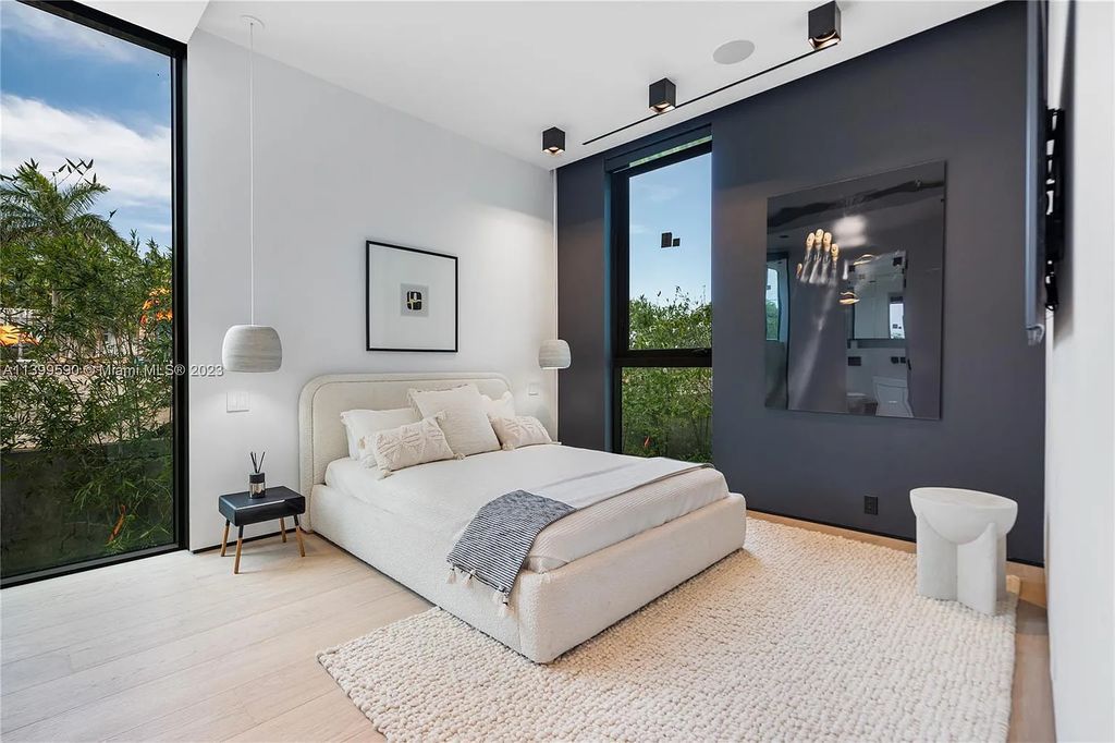 Welcome to Villa Marco at 1369 N Venetian Way, Miami Beach, Florida. Developed by Sabal Development, this masterfully crafted residence captures breathtaking bay views and natural light. With 5 beds and 6 baths spanning 7,283 sqft, it offers elegance, relaxation, and entertainment. 