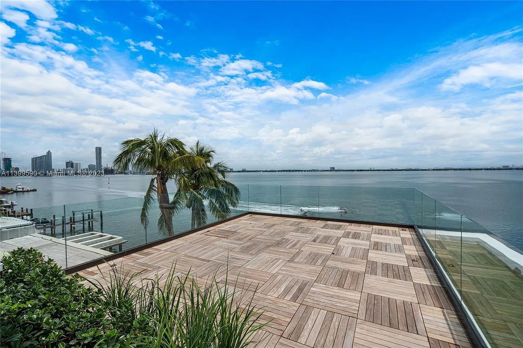 Welcome to Villa Marco at 1369 N Venetian Way, Miami Beach, Florida. Developed by Sabal Development, this masterfully crafted residence captures breathtaking bay views and natural light. With 5 beds and 6 baths spanning 7,283 sqft, it offers elegance, relaxation, and entertainment. 