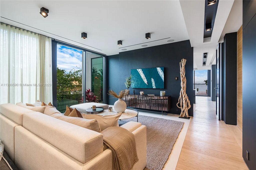Welcome to Villa Marco at 1369 N Venetian Way, Miami Beach, Florida. Developed by Sabal Development, this masterfully crafted residence captures breathtaking bay views and natural light. With 5 beds and 6 baths spanning 7,283 sqft, it offers elegance, relaxation, and entertainment. 