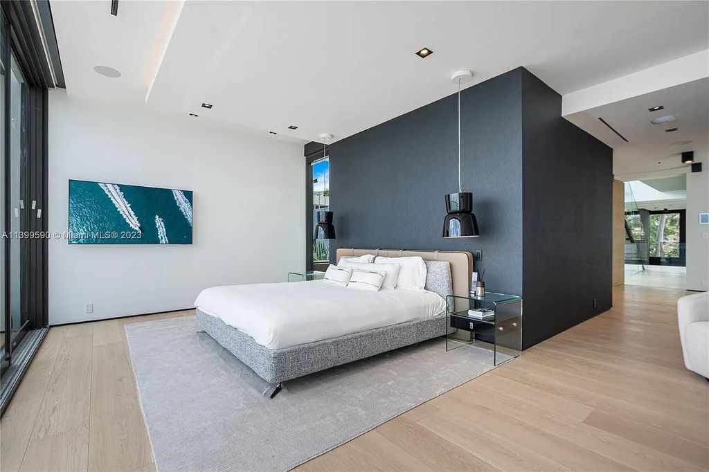 Welcome to Villa Marco at 1369 N Venetian Way, Miami Beach, Florida. Developed by Sabal Development, this masterfully crafted residence captures breathtaking bay views and natural light. With 5 beds and 6 baths spanning 7,283 sqft, it offers elegance, relaxation, and entertainment. 