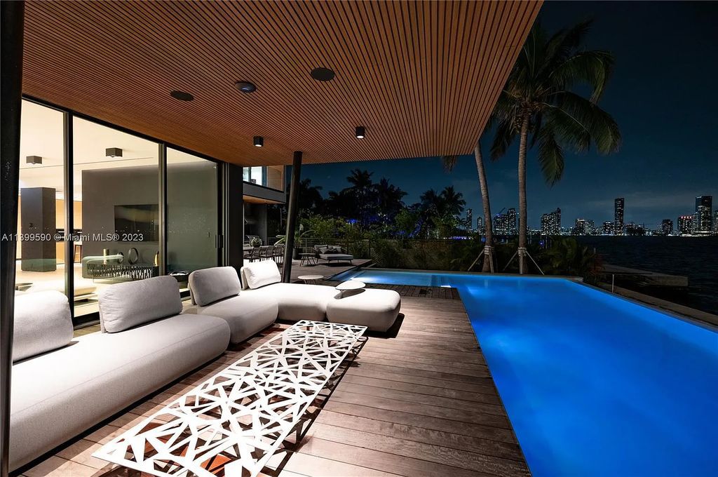 Welcome to Villa Marco at 1369 N Venetian Way, Miami Beach, Florida. Developed by Sabal Development, this masterfully crafted residence captures breathtaking bay views and natural light. With 5 beds and 6 baths spanning 7,283 sqft, it offers elegance, relaxation, and entertainment. 