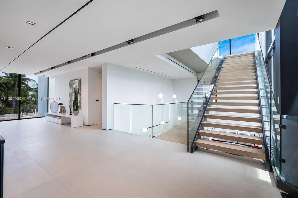 Welcome to Villa Marco at 1369 N Venetian Way, Miami Beach, Florida. Developed by Sabal Development, this masterfully crafted residence captures breathtaking bay views and natural light. With 5 beds and 6 baths spanning 7,283 sqft, it offers elegance, relaxation, and entertainment. 