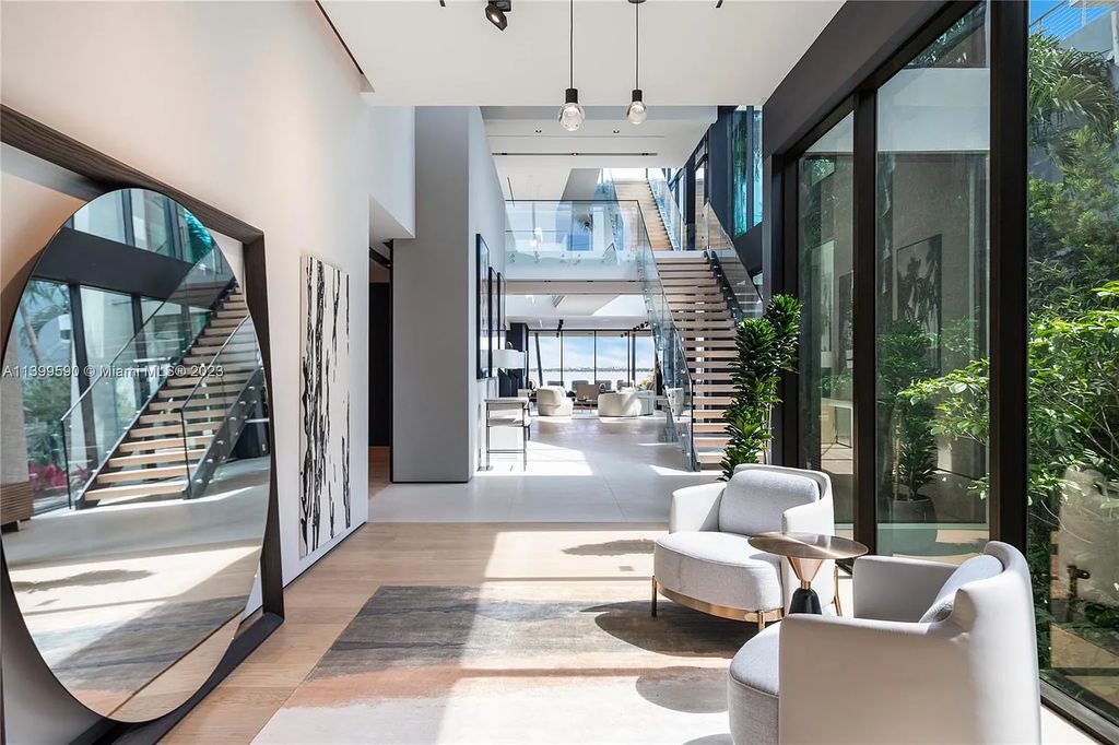 Welcome to Villa Marco at 1369 N Venetian Way, Miami Beach, Florida. Developed by Sabal Development, this masterfully crafted residence captures breathtaking bay views and natural light. With 5 beds and 6 baths spanning 7,283 sqft, it offers elegance, relaxation, and entertainment. 