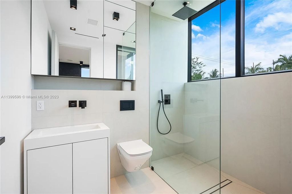 Welcome to Villa Marco at 1369 N Venetian Way, Miami Beach, Florida. Developed by Sabal Development, this masterfully crafted residence captures breathtaking bay views and natural light. With 5 beds and 6 baths spanning 7,283 sqft, it offers elegance, relaxation, and entertainment. 