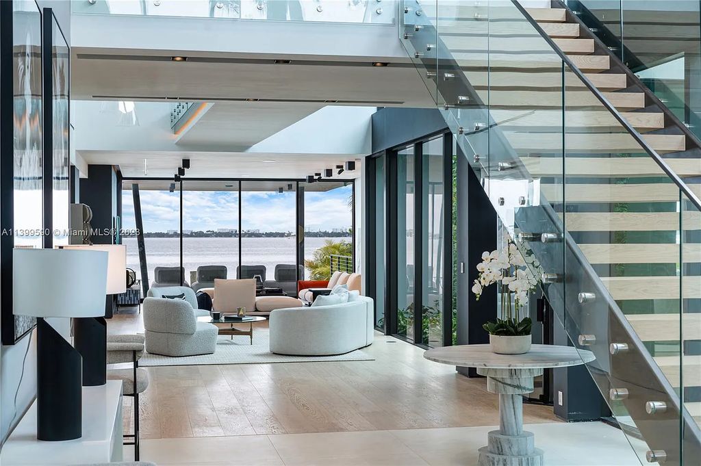 Welcome to Villa Marco at 1369 N Venetian Way, Miami Beach, Florida. Developed by Sabal Development, this masterfully crafted residence captures breathtaking bay views and natural light. With 5 beds and 6 baths spanning 7,283 sqft, it offers elegance, relaxation, and entertainment. 
