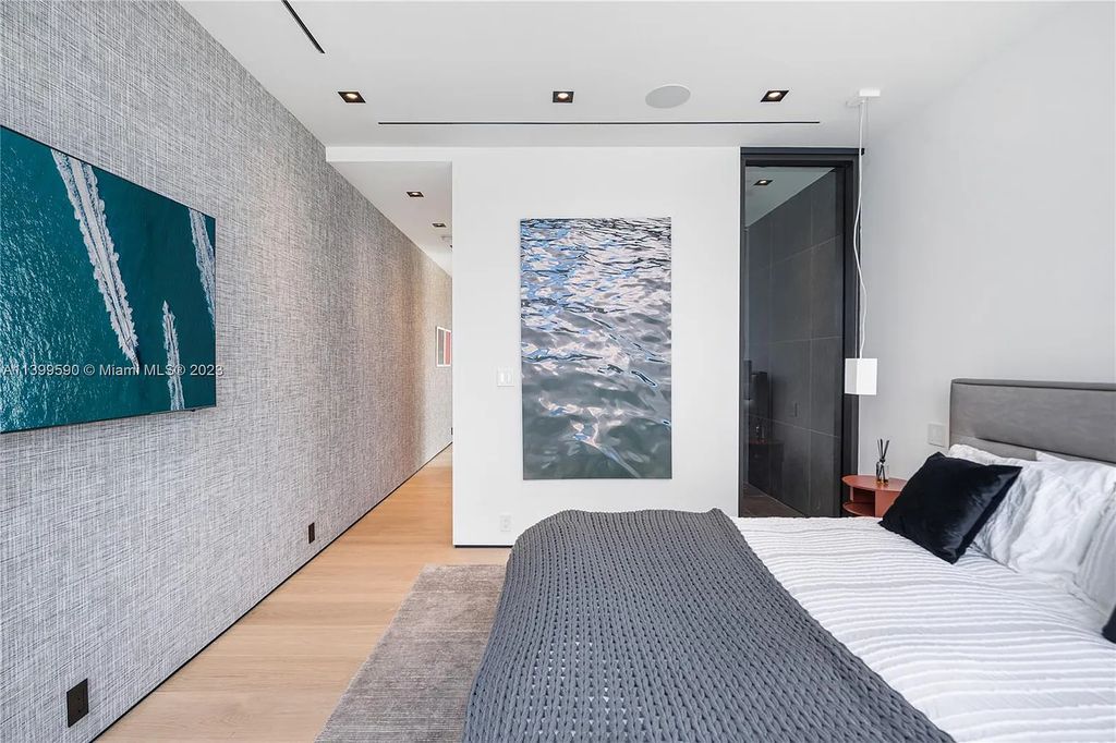 Welcome to Villa Marco at 1369 N Venetian Way, Miami Beach, Florida. Developed by Sabal Development, this masterfully crafted residence captures breathtaking bay views and natural light. With 5 beds and 6 baths spanning 7,283 sqft, it offers elegance, relaxation, and entertainment. 
