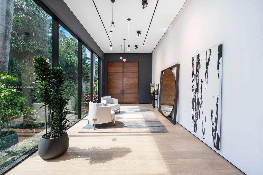 Welcome to Villa Marco at 1369 N Venetian Way, Miami Beach, Florida. Developed by Sabal Development, this masterfully crafted residence captures breathtaking bay views and natural light. With 5 beds and 6 baths spanning 7,283 sqft, it offers elegance, relaxation, and entertainment. 