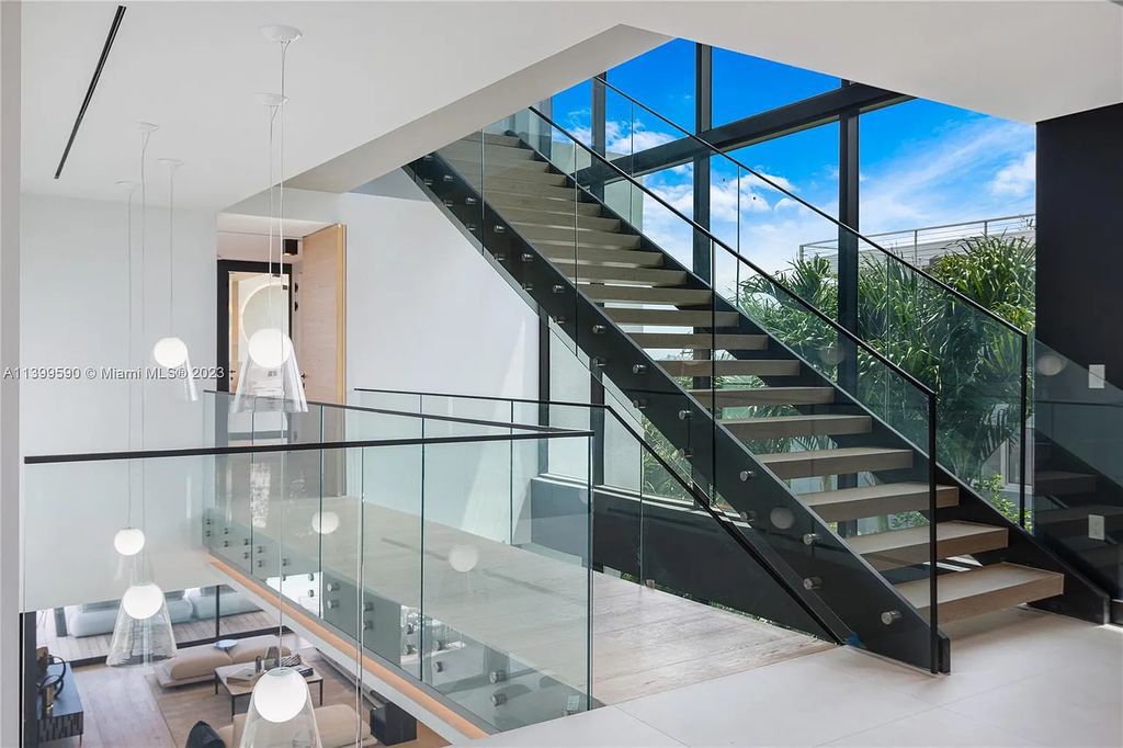 Welcome to Villa Marco at 1369 N Venetian Way, Miami Beach, Florida. Developed by Sabal Development, this masterfully crafted residence captures breathtaking bay views and natural light. With 5 beds and 6 baths spanning 7,283 sqft, it offers elegance, relaxation, and entertainment. 