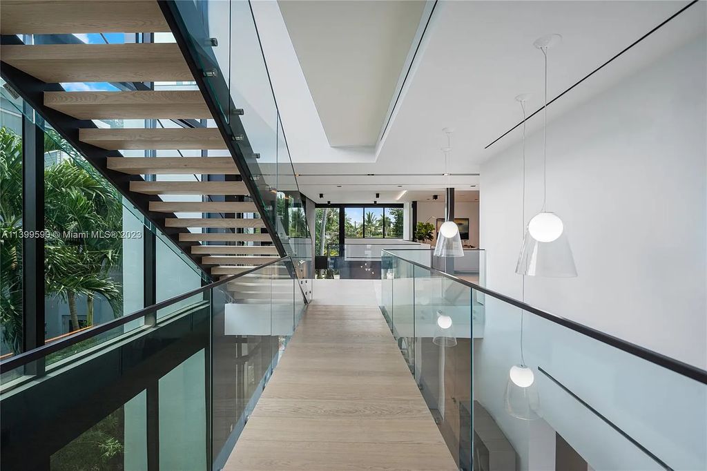 Welcome to Villa Marco at 1369 N Venetian Way, Miami Beach, Florida. Developed by Sabal Development, this masterfully crafted residence captures breathtaking bay views and natural light. With 5 beds and 6 baths spanning 7,283 sqft, it offers elegance, relaxation, and entertainment. 
