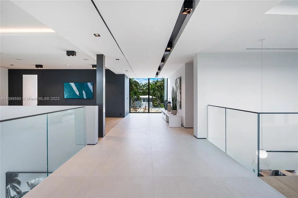Welcome to Villa Marco at 1369 N Venetian Way, Miami Beach, Florida. Developed by Sabal Development, this masterfully crafted residence captures breathtaking bay views and natural light. With 5 beds and 6 baths spanning 7,283 sqft, it offers elegance, relaxation, and entertainment. 