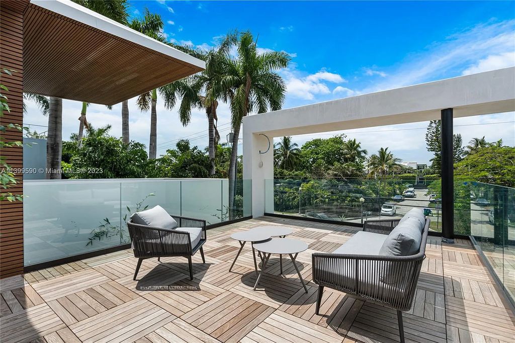 Welcome to Villa Marco at 1369 N Venetian Way, Miami Beach, Florida. Developed by Sabal Development, this masterfully crafted residence captures breathtaking bay views and natural light. With 5 beds and 6 baths spanning 7,283 sqft, it offers elegance, relaxation, and entertainment. 