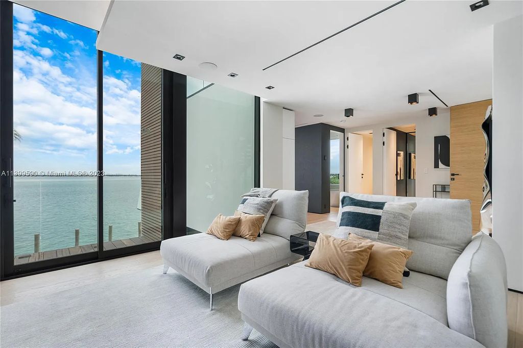 Welcome to Villa Marco at 1369 N Venetian Way, Miami Beach, Florida. Developed by Sabal Development, this masterfully crafted residence captures breathtaking bay views and natural light. With 5 beds and 6 baths spanning 7,283 sqft, it offers elegance, relaxation, and entertainment. 