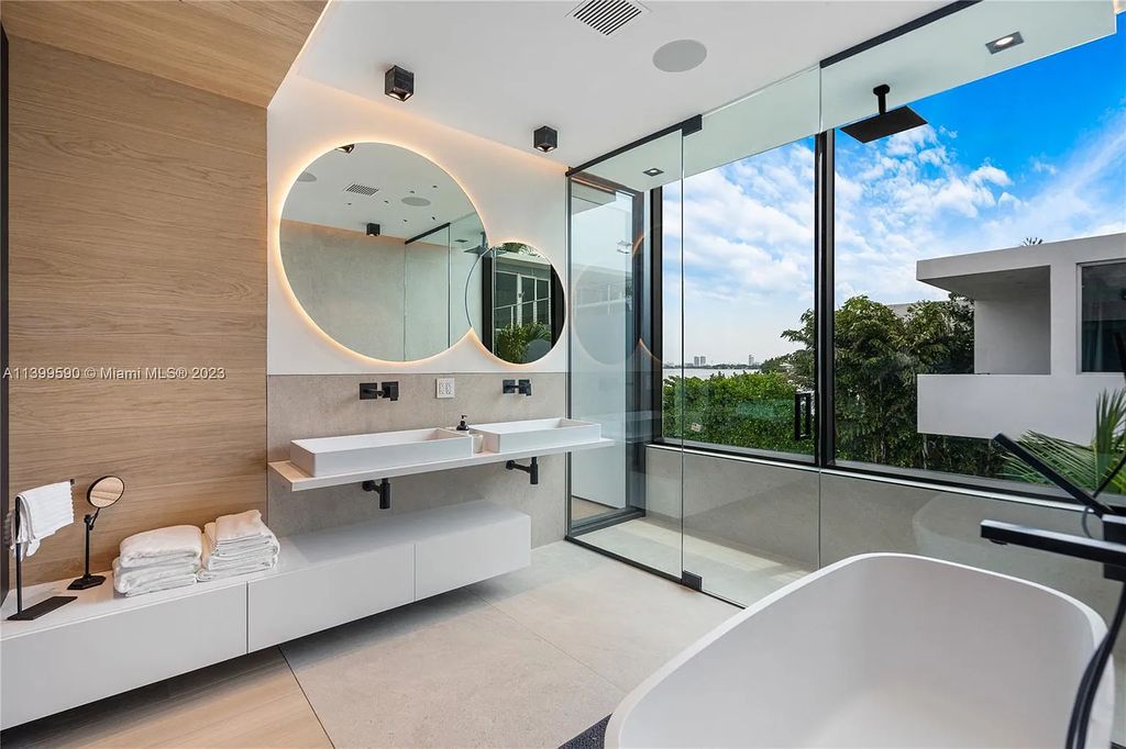 Welcome to Villa Marco at 1369 N Venetian Way, Miami Beach, Florida. Developed by Sabal Development, this masterfully crafted residence captures breathtaking bay views and natural light. With 5 beds and 6 baths spanning 7,283 sqft, it offers elegance, relaxation, and entertainment. 