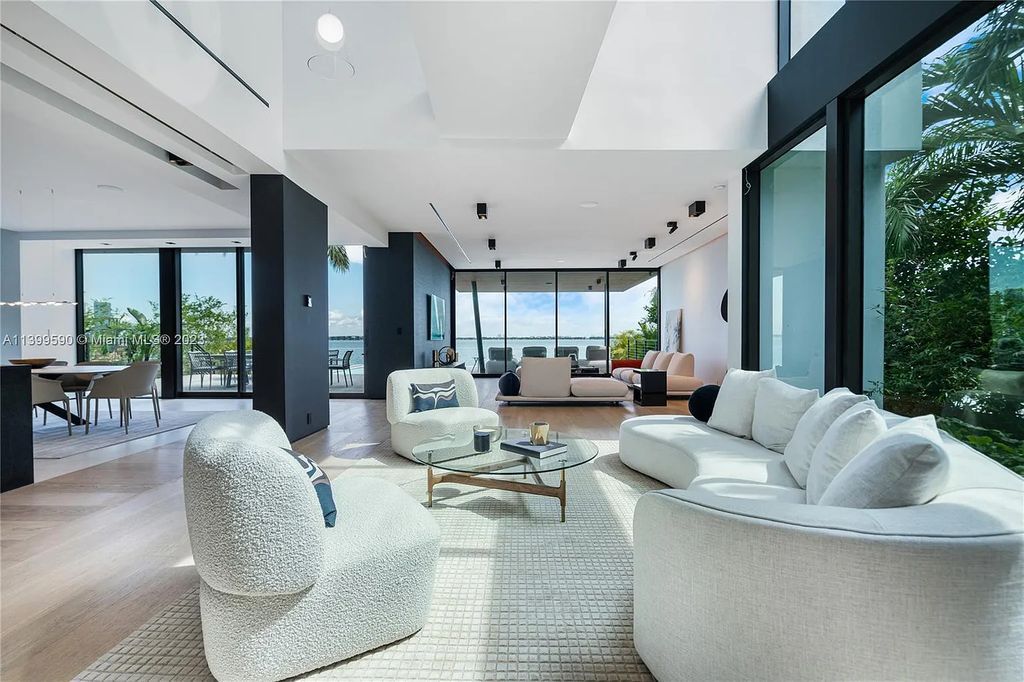 Welcome to Villa Marco at 1369 N Venetian Way, Miami Beach, Florida. Developed by Sabal Development, this masterfully crafted residence captures breathtaking bay views and natural light. With 5 beds and 6 baths spanning 7,283 sqft, it offers elegance, relaxation, and entertainment. 