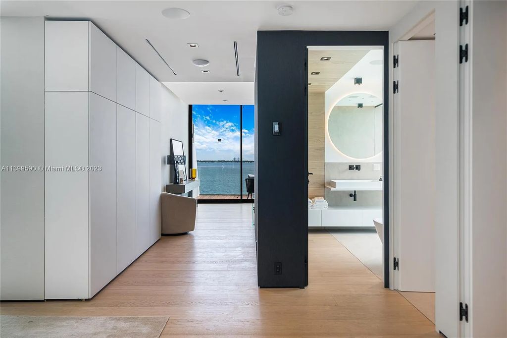Welcome to Villa Marco at 1369 N Venetian Way, Miami Beach, Florida. Developed by Sabal Development, this masterfully crafted residence captures breathtaking bay views and natural light. With 5 beds and 6 baths spanning 7,283 sqft, it offers elegance, relaxation, and entertainment. 