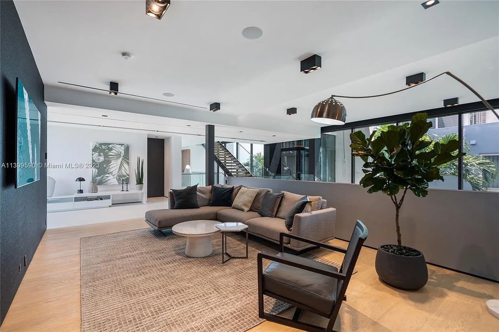 Welcome to Villa Marco at 1369 N Venetian Way, Miami Beach, Florida. Developed by Sabal Development, this masterfully crafted residence captures breathtaking bay views and natural light. With 5 beds and 6 baths spanning 7,283 sqft, it offers elegance, relaxation, and entertainment. 