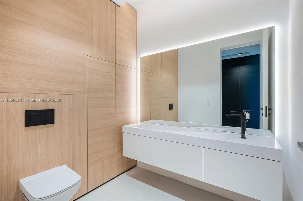 Welcome to Villa Marco at 1369 N Venetian Way, Miami Beach, Florida. Developed by Sabal Development, this masterfully crafted residence captures breathtaking bay views and natural light. With 5 beds and 6 baths spanning 7,283 sqft, it offers elegance, relaxation, and entertainment. 