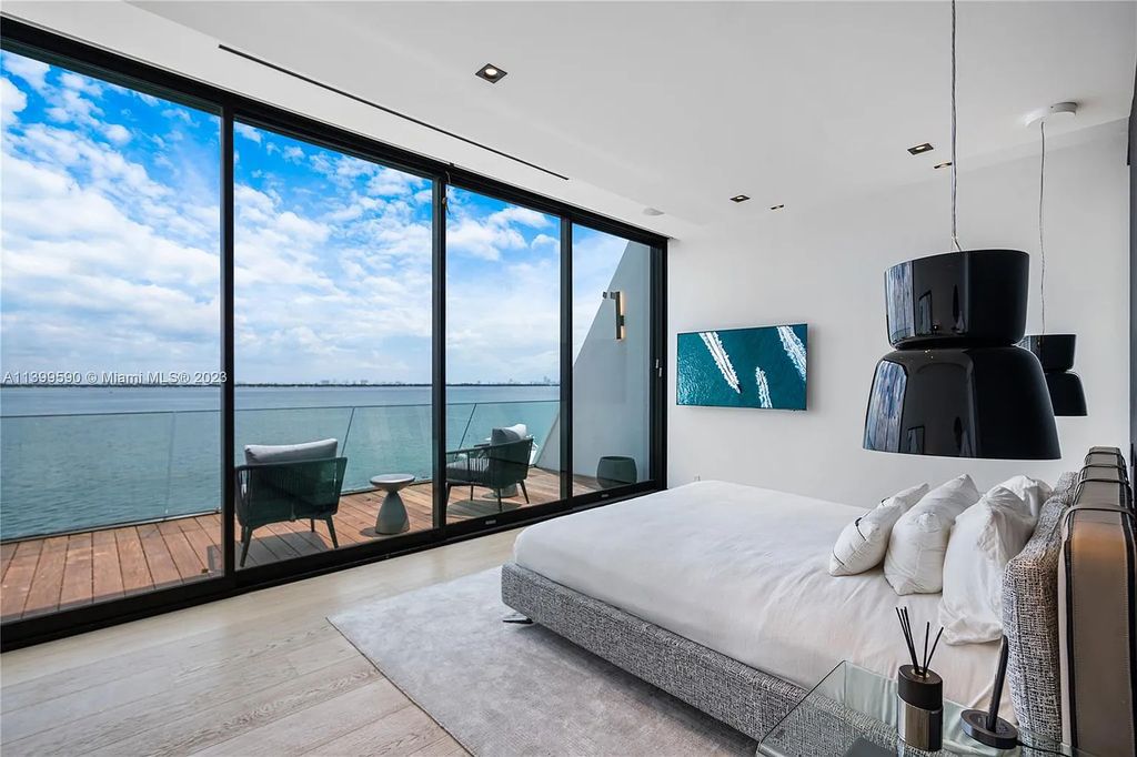Welcome to Villa Marco at 1369 N Venetian Way, Miami Beach, Florida. Developed by Sabal Development, this masterfully crafted residence captures breathtaking bay views and natural light. With 5 beds and 6 baths spanning 7,283 sqft, it offers elegance, relaxation, and entertainment. 