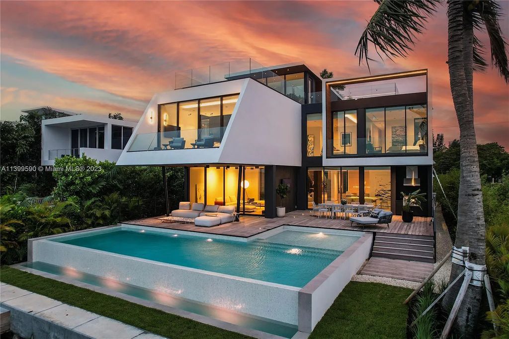 Welcome to Villa Marco at 1369 N Venetian Way, Miami Beach, Florida. Developed by Sabal Development, this masterfully crafted residence captures breathtaking bay views and natural light. With 5 beds and 6 baths spanning 7,283 sqft, it offers elegance, relaxation, and entertainment. 