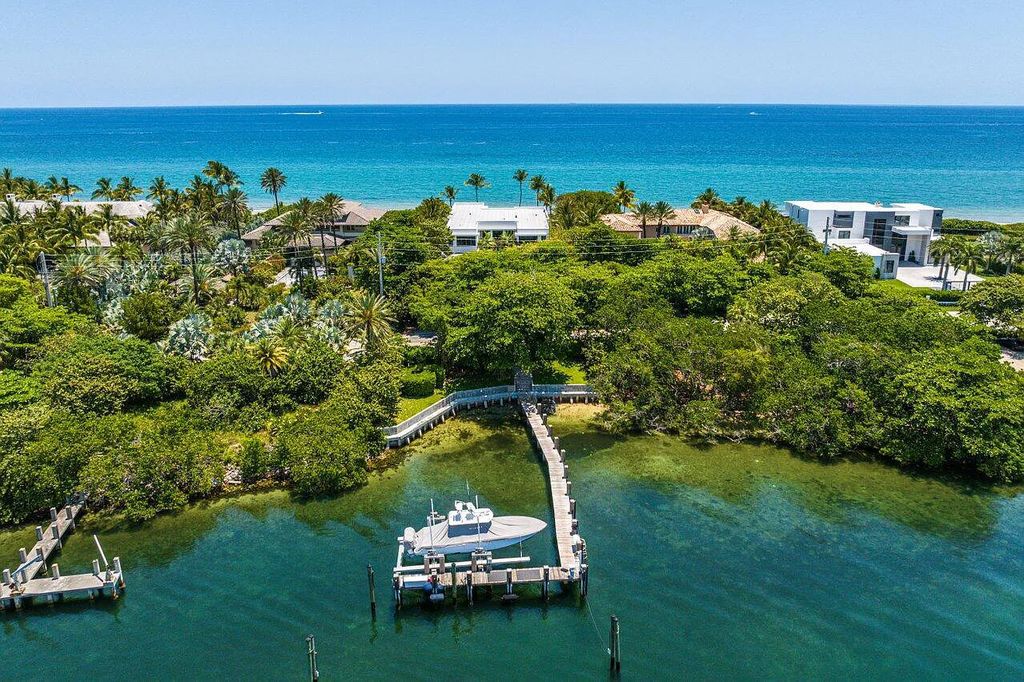Welcome to 1115 Hillsboro Mile, a luxurious 6-bedrooms, 8-bathrooms home in Hillsboro Beach, Florida. Built in 2017 by Mark Timothy Luxury Homes and Affiniti Architects, this property offers stunning ocean views and a private boat dock.