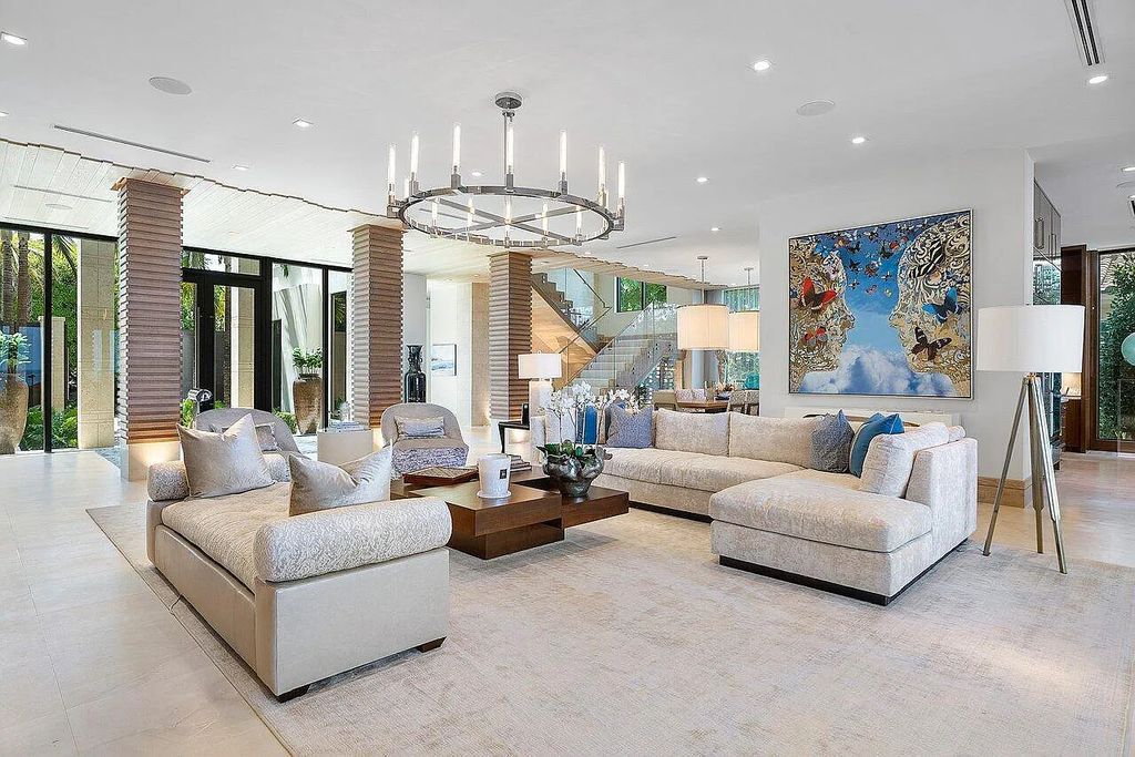 Welcome to 1115 Hillsboro Mile, a luxurious 6-bedrooms, 8-bathrooms home in Hillsboro Beach, Florida. Built in 2017 by Mark Timothy Luxury Homes and Affiniti Architects, this property offers stunning ocean views and a private boat dock.