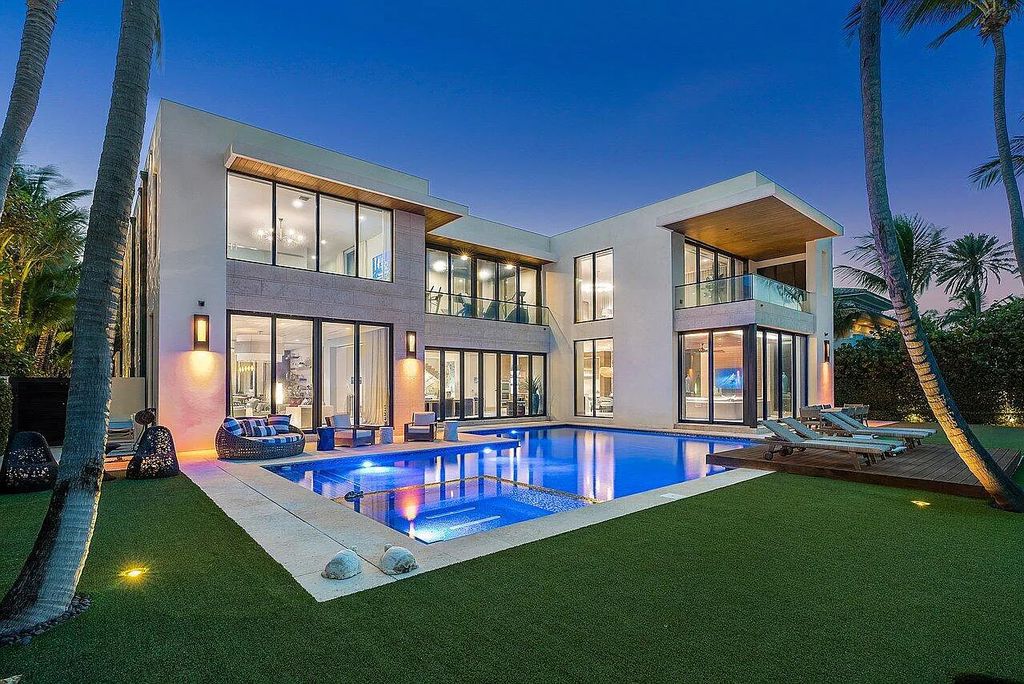 Welcome to 1115 Hillsboro Mile, a luxurious 6-bedrooms, 8-bathrooms home in Hillsboro Beach, Florida. Built in 2017 by Mark Timothy Luxury Homes and Affiniti Architects, this property offers stunning ocean views and a private boat dock.