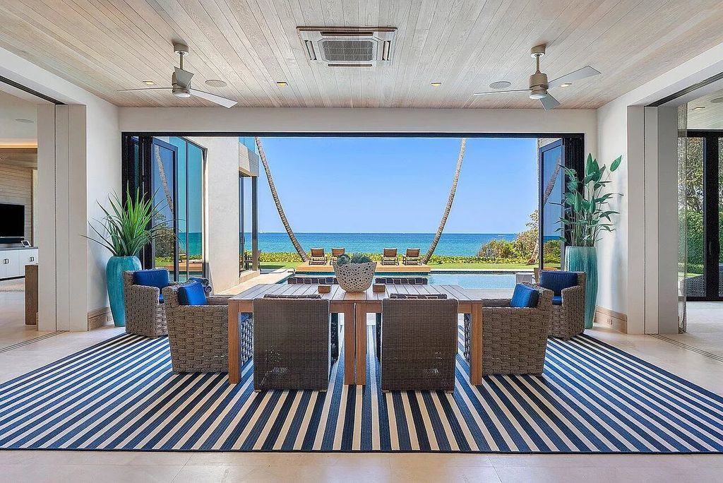 Welcome to 1115 Hillsboro Mile, a luxurious 6-bedrooms, 8-bathrooms home in Hillsboro Beach, Florida. Built in 2017 by Mark Timothy Luxury Homes and Affiniti Architects, this property offers stunning ocean views and a private boat dock.