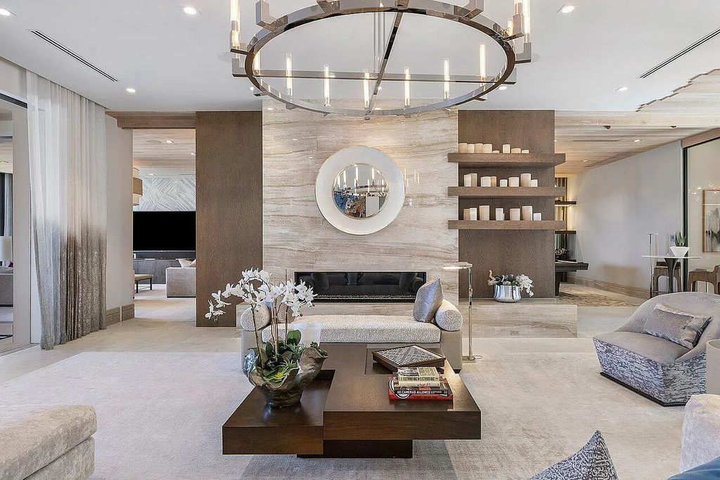 Welcome to 1115 Hillsboro Mile, a luxurious 6-bedrooms, 8-bathrooms home in Hillsboro Beach, Florida. Built in 2017 by Mark Timothy Luxury Homes and Affiniti Architects, this property offers stunning ocean views and a private boat dock.