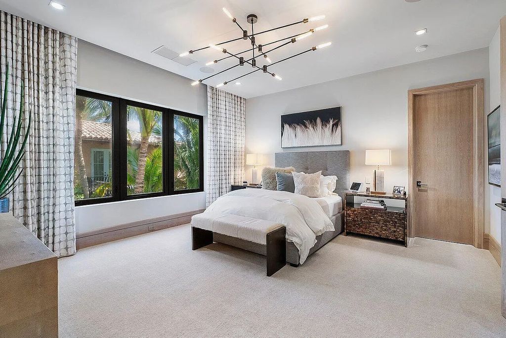 Welcome to 1115 Hillsboro Mile, a luxurious 6-bedrooms, 8-bathrooms home in Hillsboro Beach, Florida. Built in 2017 by Mark Timothy Luxury Homes and Affiniti Architects, this property offers stunning ocean views and a private boat dock.
