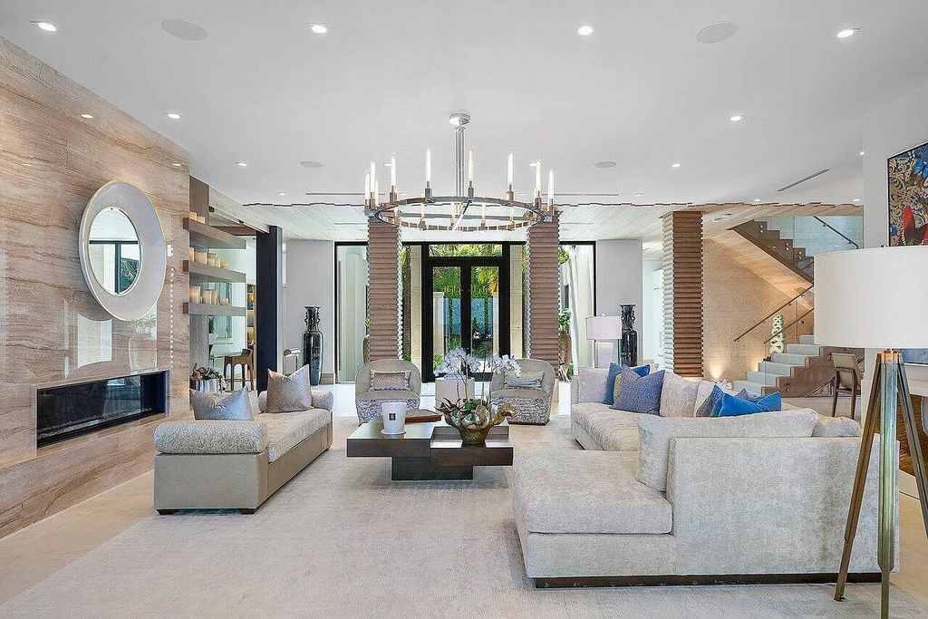 Welcome to 1115 Hillsboro Mile, a luxurious 6-bedrooms, 8-bathrooms home in Hillsboro Beach, Florida. Built in 2017 by Mark Timothy Luxury Homes and Affiniti Architects, this property offers stunning ocean views and a private boat dock.